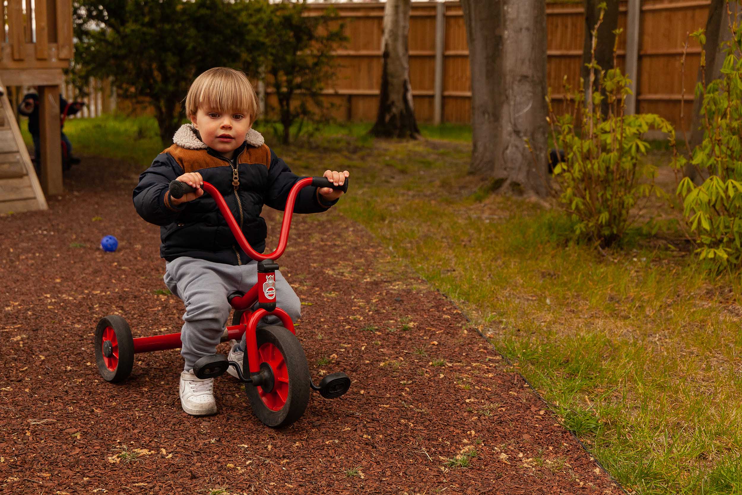 Boy on a tricycle